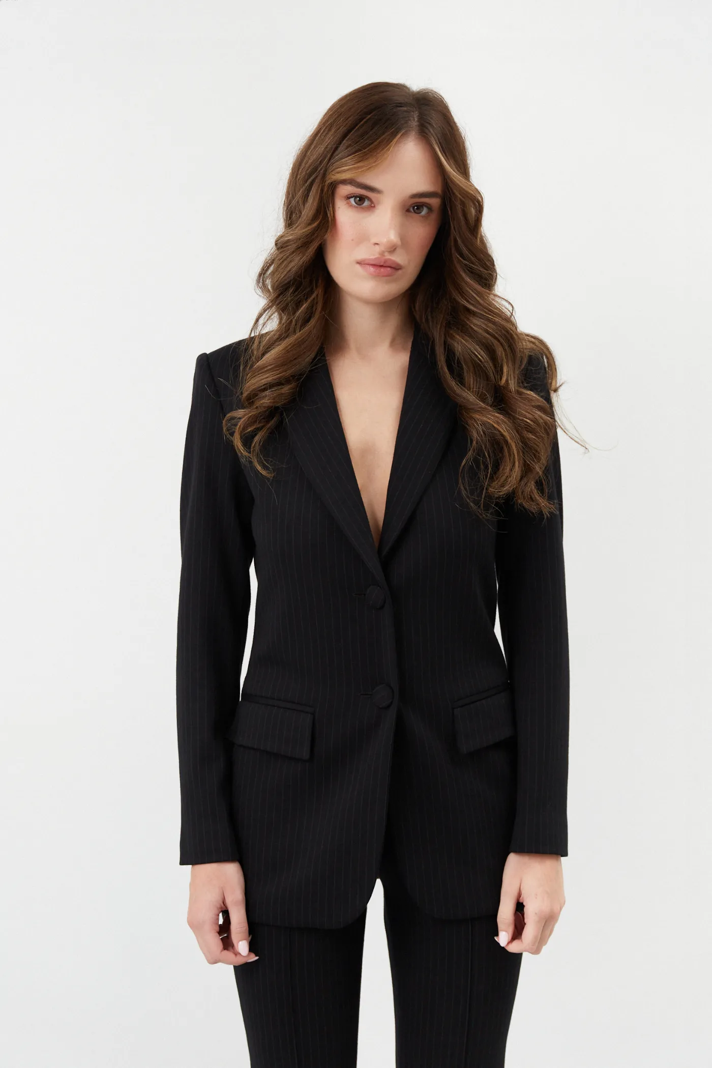 Prążkowany garnitur Tom z rozszerzanymi spodniami